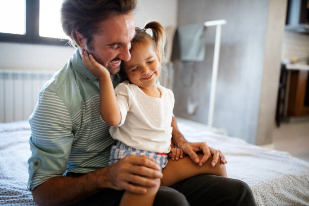 istock Father and daughter spending time together at home 1199847875