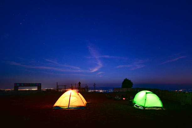 istock Camping tents on the mountain. 1199853810