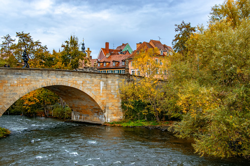 Autumn scenery of Regnitz river in Bamberg, Germany. UNESCO World Heritage Site.
