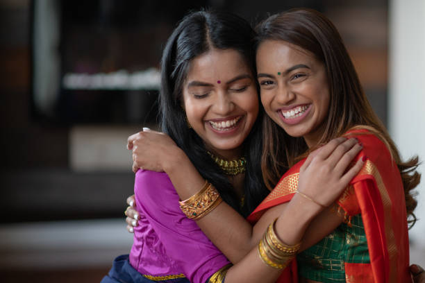 istock Two (2) Happy and Attractive Indian Sisters 1199856462