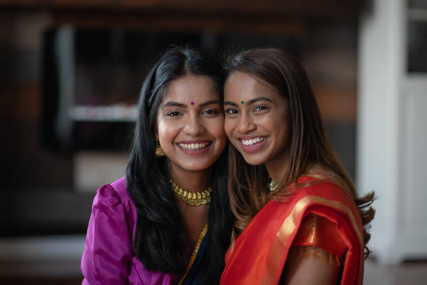istock Two (2) Happy and Attractive Indian Sisters 1199856485