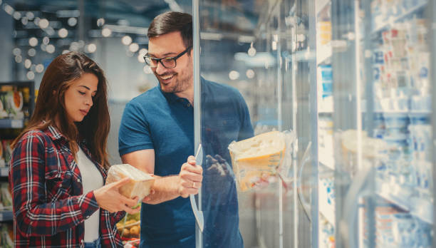 istock A couple choosing cheese at the grocery store 1199856699