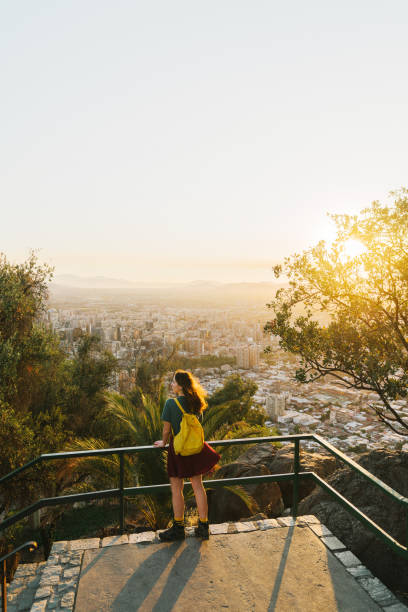 istock Woman in Santiago at sunset 1199857455