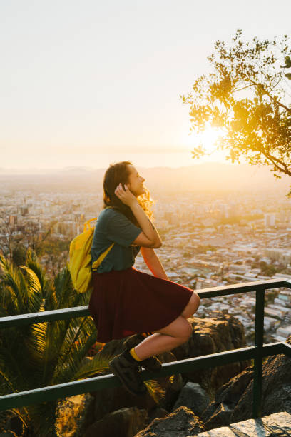 istock Woman in Santiago at sunset 1199857490