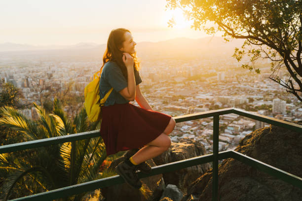 istock Woman in Santiago at sunset 1199857493