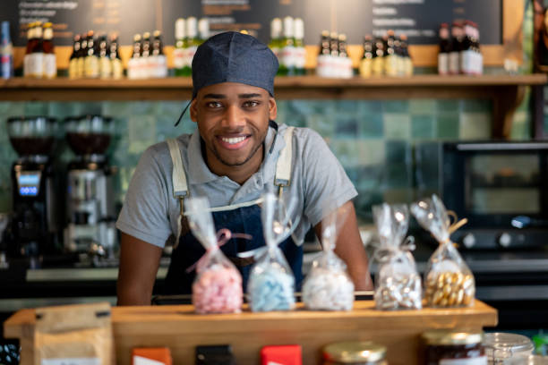 istock African American waiter working at a cafe 1199858202