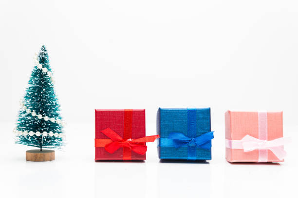 istock Christmas tree with gifts on white background 1199863185