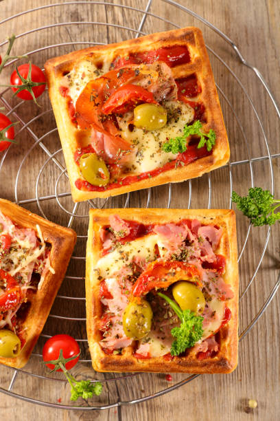 istock waffle pizza with tomato sauce, ham and cheese 1199864638
