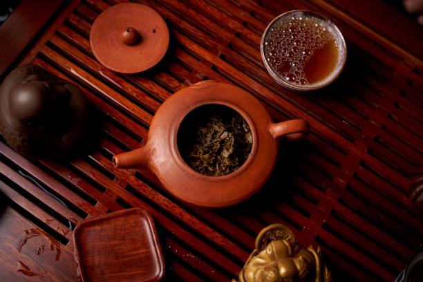 istock Brewed tea leaves in a teapot. 1199866222