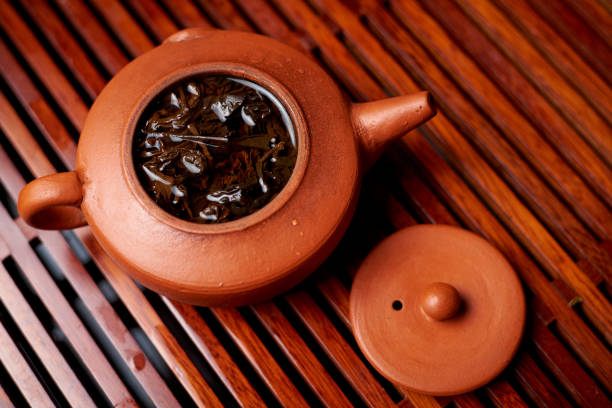 istock Brewed tea leaves in a teapot. 1199866805