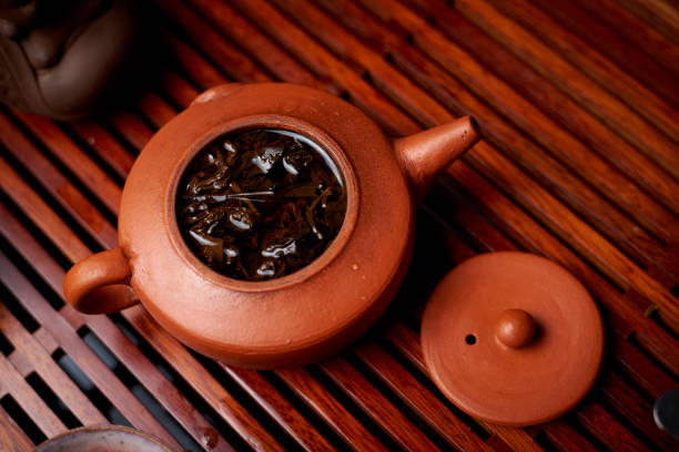 istock Brewed tea leaves in a teapot. 1199866812