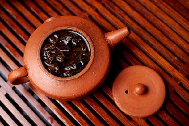 istock Brewed tea leaves in a teapot. 1199866815