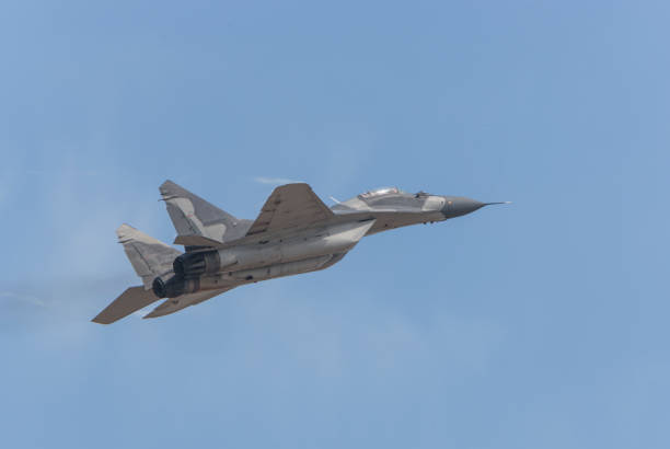 istock Mig 29, Mig-29 Fulcrum fighter Jet in flight 1199868773