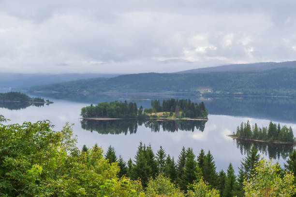 istock Islands in mirror blank water 1199870715