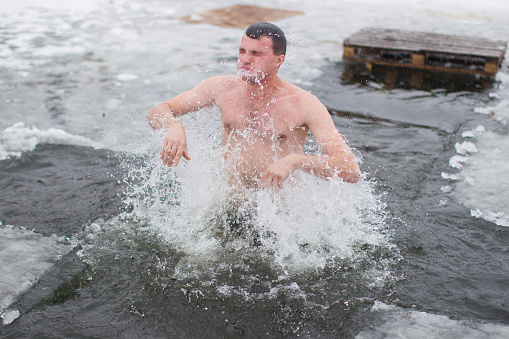 Day of the Cross Baptism.Swim in the ice hole at the baptism of the Lord
