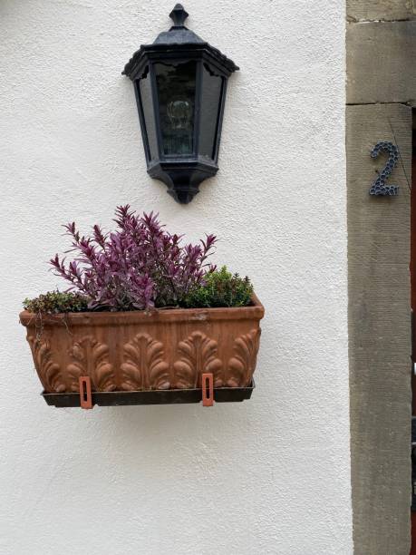 istock House number 2, lamp and flowers 1199875680