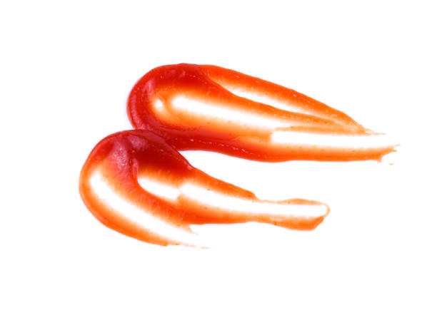 istock tomato sauce or ketchup isolated on a white background 1199879779