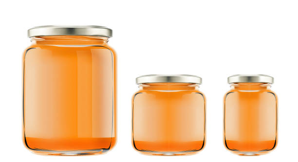 istock bottles with honey isolated 1199879952