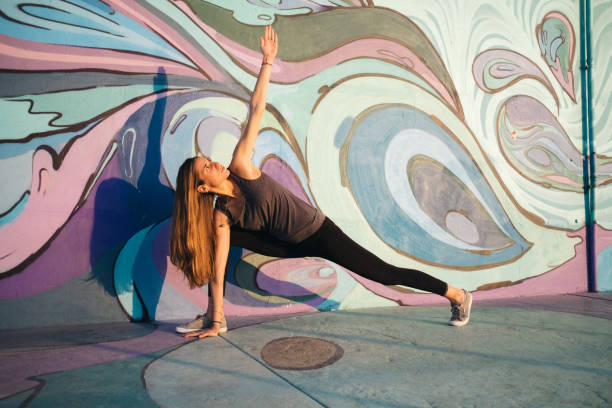 istock Yoga performance against  colorful wall 1199882787