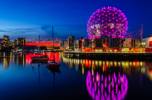 Vancouver, Canada - October 20, 2018 : Twilight Vancouver Downtown skyline of False Creek with World of Science and Stadium in British Columbia, Canada.