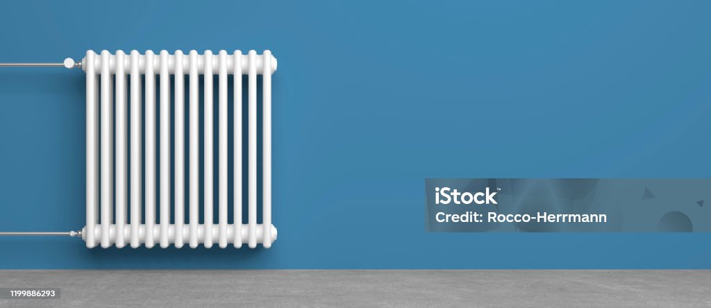 radiator heater technology radiator heater in living room in front of wall as template Radiator - Heater Stock Photo