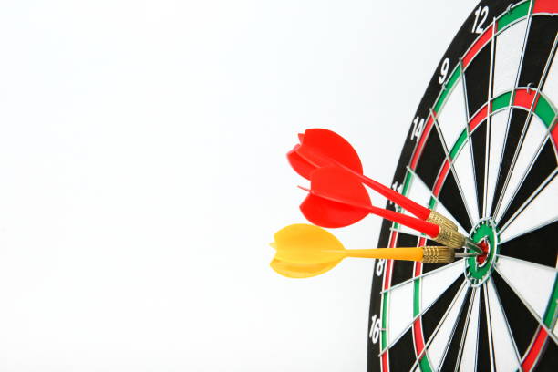 istock darts on white background with copy space. three darts hit the target 1199887069