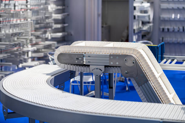 istock Industrial Manufacturing Conveyor Belt Roller Track System 1199887345