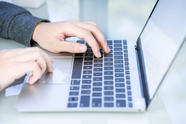 istock Woman working at home office using laptop searching web, browsing information 1199887640