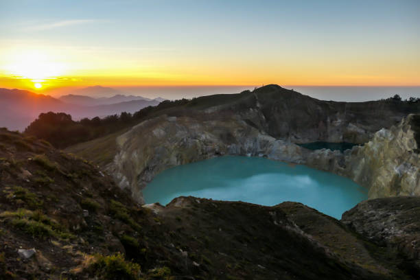 istock Kelimutu - Turquoise colored volcanic lake 1199887770