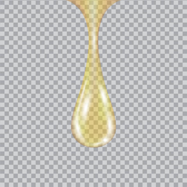 istock Bright gold drop of oil essence. 1199888911
