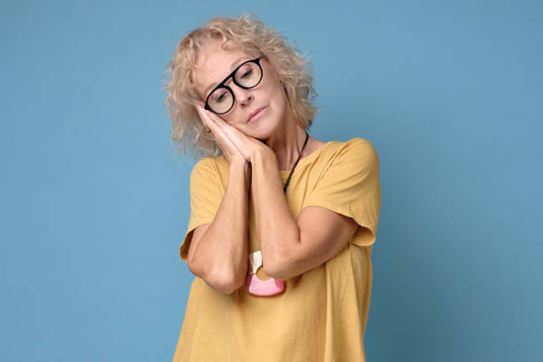 istock Calm attractive dreaming mature woman having rest, relaxing. 1199890645