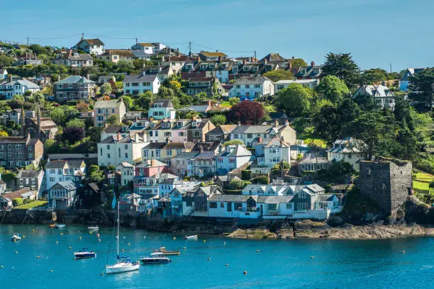 The small coastal town of Fowey with hillside houses. Cornwall, UK.