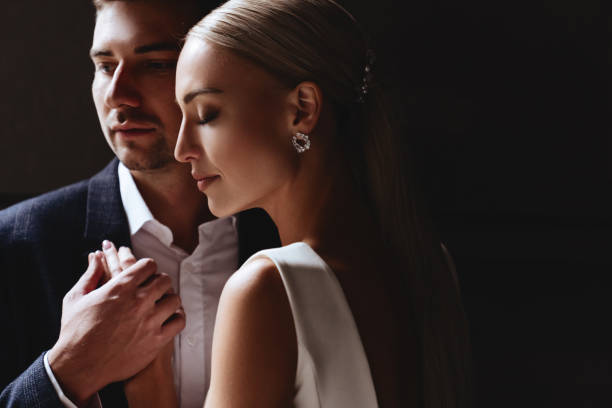 istock Happy bride and groom near old castle 1199892353