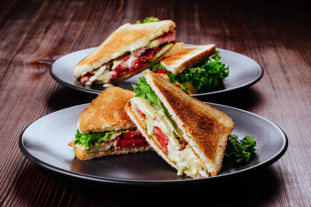 Sandwich bread tomato, lettuce and yellow cheese