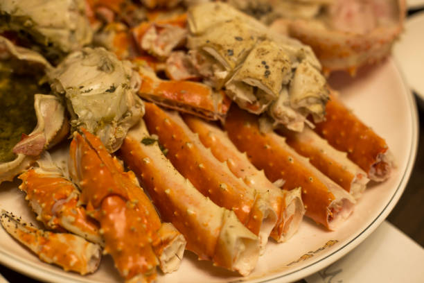 istock king crab legs meat on white plate 1199894207