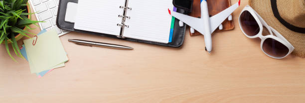 istock Business trip concept. Accessories on desk table 1199894385