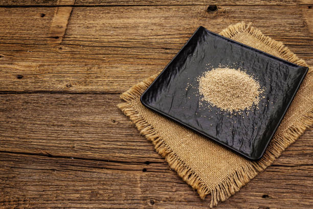 Dashi, traditional Japanese seasoning isolated on white background. Indispensable ingredient for cooking soup stock. Finished dry granules