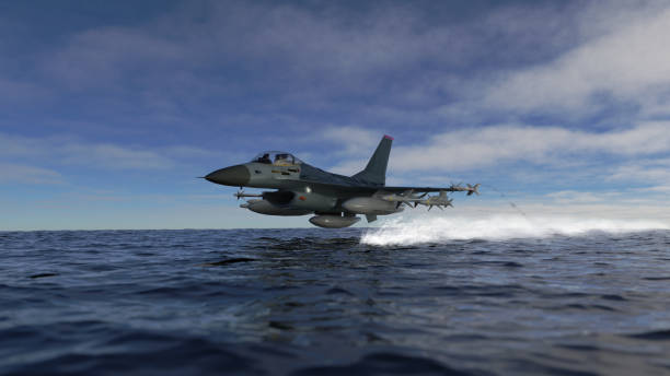 istock American jet fighter low flying over sea 3d render 1199894483