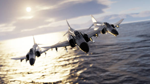 istock Three jets flying together over sea in vic formation 3d render 1199894556