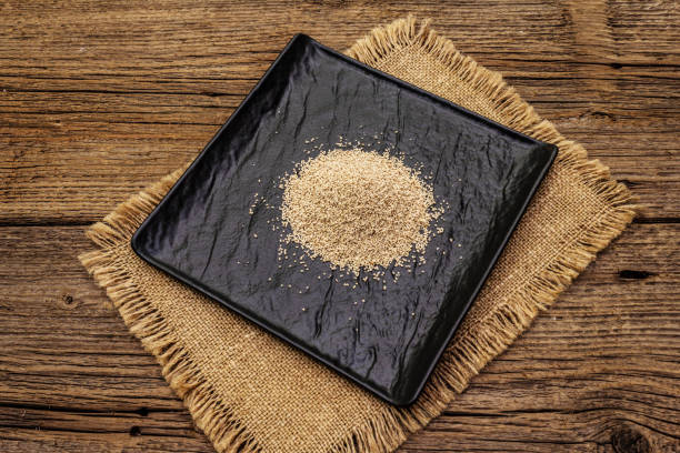 istock Dashi, traditional Japanese seasoning isolated on white background. Indispensable ingredient for cooking soup stock. Finished dry granules 1199894770