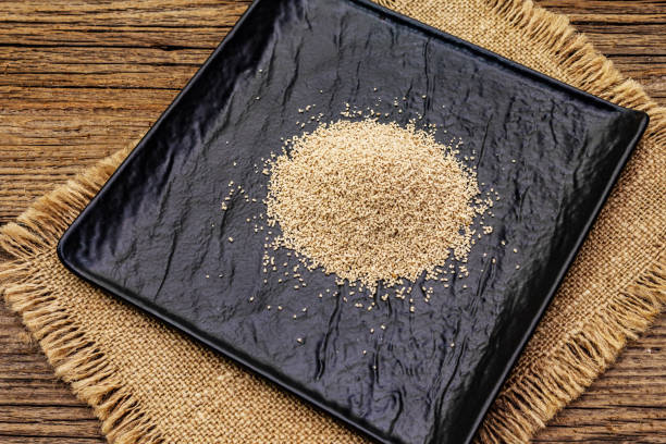 istock Dashi, traditional Japanese seasoning isolated on white background. Indispensable ingredient for cooking soup stock. Finished dry granules 1199894949