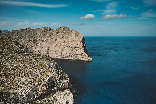Idyllic Shot Of Cliff In Sea Against Sky At Majorca