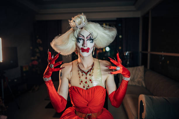 istock Drag queen sitting in dark apartment 1199895590