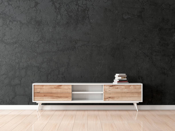 istock Modern bureau or tv console mockup in empty living room with black concrete wall 1199896094