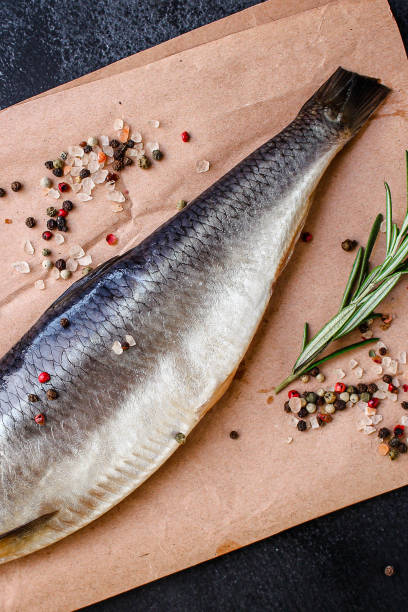 istock herring (healthy food, salted raw fish and spices) menu concept. food background. top view. copy space 1199896142