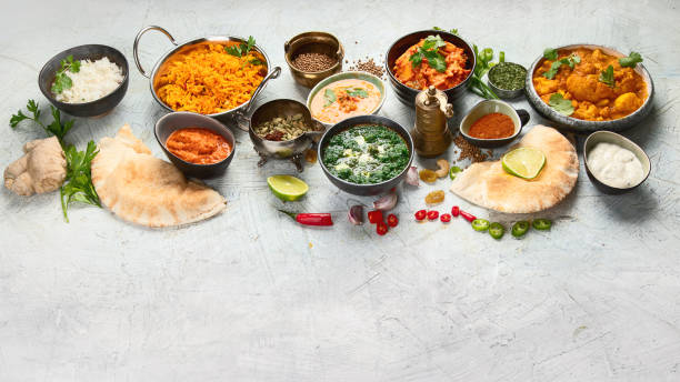 istock Assorted indian food on black background.. 1199896512