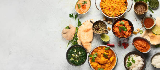 istock Assorted indian food on black background.. 1199897101