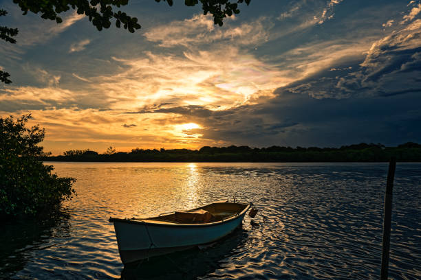 istock Boat on calm lake 1199900143