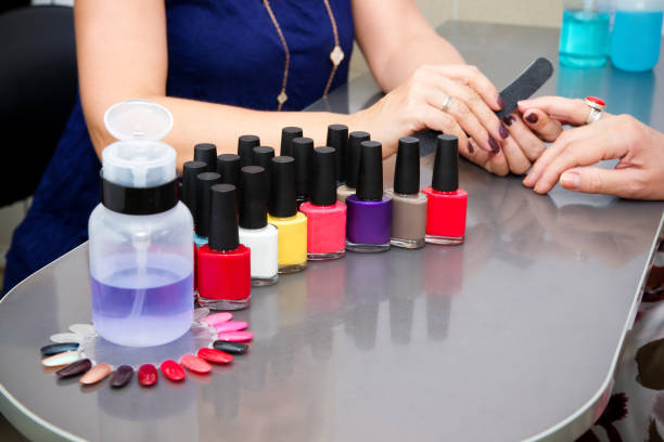 istock The master uses a nail file, making a manicure in the spa salon 1199900264