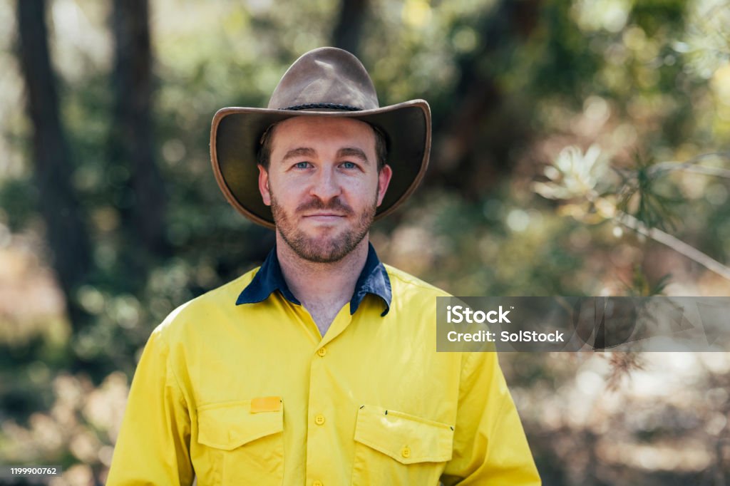 Portrait of a Environmental Conservationist Portrait of a man looking at the camera wearing a bush hat and looking positive Australia Stock Photo